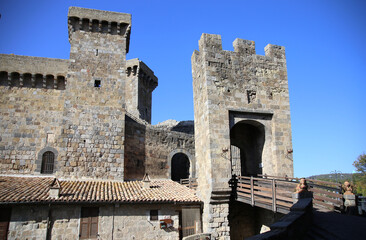 Bolsena castle complex, under a blue sky, Rocca Monaldeschi della Cervara, Bolsena, Tuscia, Lazio, Italy