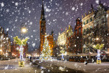 Beautiful Christmas tree in the old town of Gdansk at snowy night. Poland