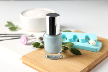 Concept of nail care with manicure accessories on white background