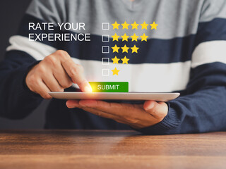 Client satisfaction surveys. People use a tablet to give feedback via the internet