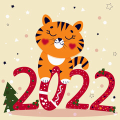Cute tiger, the symbol of the Chinese new year 2022. A wild animal. Traditional calendar, greeting card.