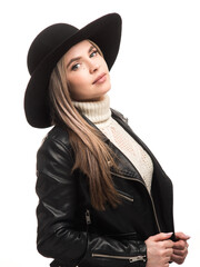 Fototapeta premium Woman in black felt hat and leather jacket