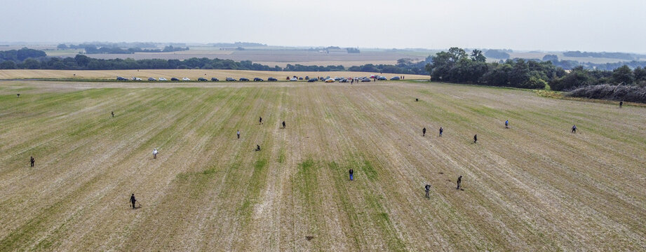 Metal detectorists heading out on a new field