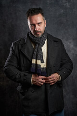 Stylish man in casual wear posing, fashion model