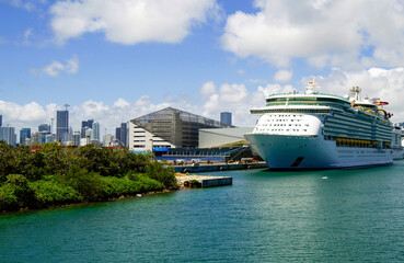 Big modern cruiseship or cruise ship liner Explorer of the Seas in Port of Miami, Florida with...