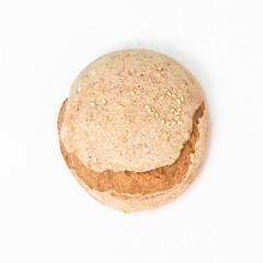 Homemade gluten-free bread bun on white background