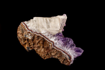 macro mineral amethyst stone with calcite black background