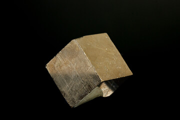 macro mineral pyrite stone on a black background - Powered by Adobe
