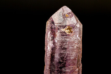 macro mineral amethyst stone on a black background