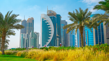 Doha city with many landmark towers , view from the corniche area.