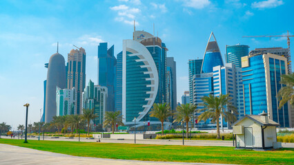 Fototapeta na wymiar Doha city with many landmark towers , view from the corniche area.
