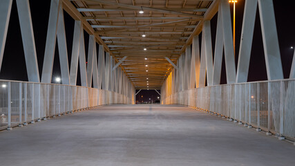 pedestrian bridge at One of the 2021 world cup stadium, thumama stadium . shot during night.