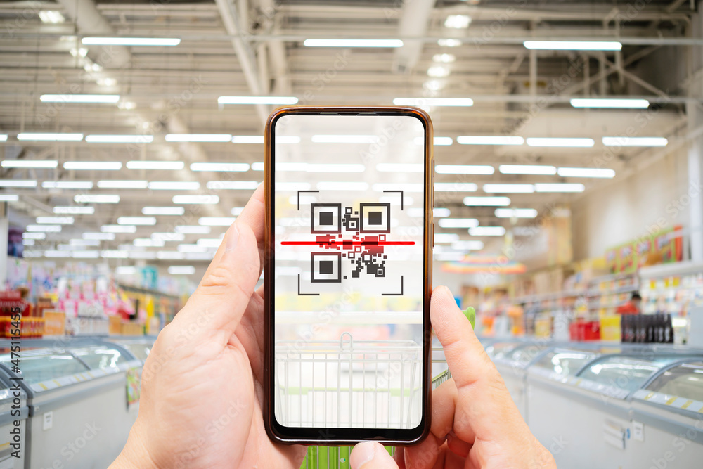 Poster modified inactive qr code used. person scanning qr code with smartphone