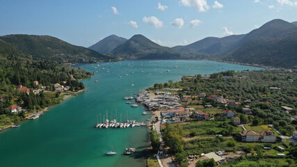 Aerial drone photo of fjord shaped port of Nydri a calm sea safe anchorage for sail boats and...