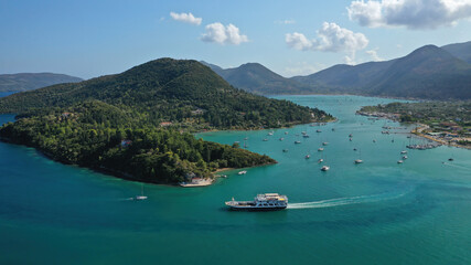 Aerial drone photo of fjord shaped port of Nydri a calm sea safe anchorage for sail boats and yachts famous for trips to Meganisi, Skorpios and other Ionian islands, Lefkada island, Greece