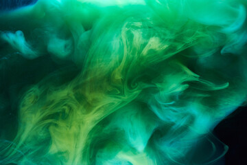 Green smoke on black ink background, colorful fog, abstract swirling emerald ocean sea, acrylic paint pigment underwater