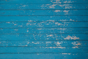Fototapeta na wymiar old wooden blue wall of planks texture as background