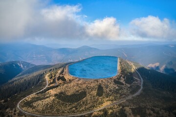 Pumped water storage hydroelectric plant reservoir aerial view