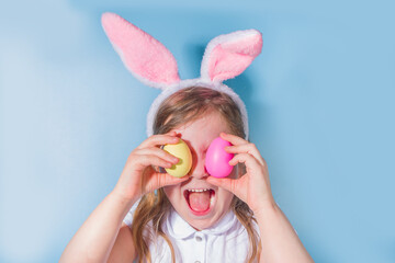 Cute little girl With colorful Easter egg