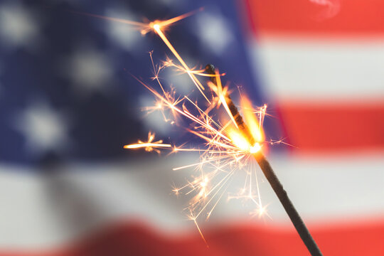 American flag and sparklers. USA, 4th of July celebration background photo