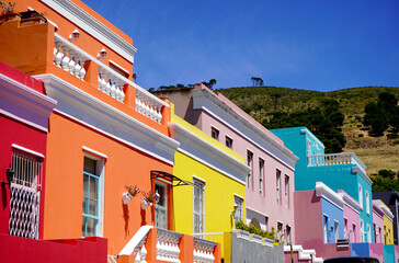 Fototapeta na wymiar Bo-Kaap district, Cape Town, South Africa - 14 December 2021 : Distinctive bright houses in the bo-kaap district of Cape Town, South Africa