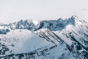 Fototapeta na wymiar Mountain peaks in winter scenery, Tatra Mountains, Poland