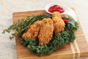 Crispy chicken wings with tomato ketchup