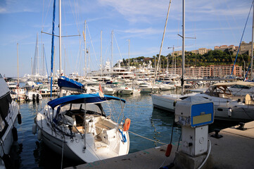 Monte Carlo harbor in Monaco. Port Hercules. Yachts in the port. Cityscape. Yacht parking.