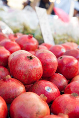 Fresh pomegranates in a farmer's market.
