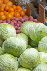 Fototapeta na wymiar Fresh cabbages in a farmer's market.