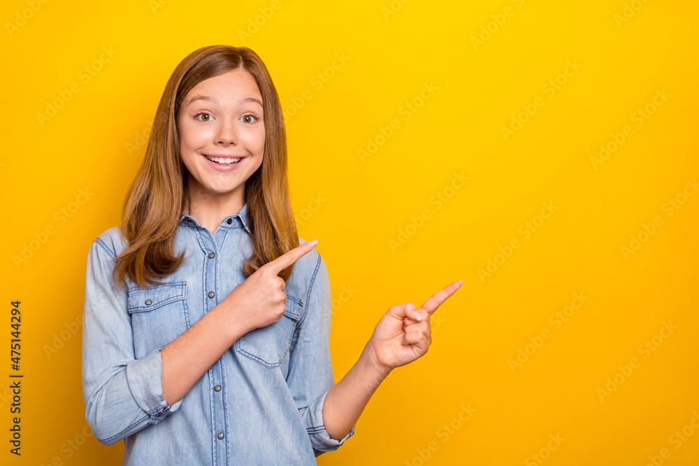 Sticker Photo of hooray teenager blond girl index promo wear jeans outfit isolated on vibrant yellow color background