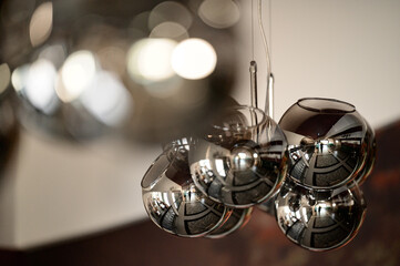 Decorative chandelier hanging from the ceiling, decoration and decoration of any house.