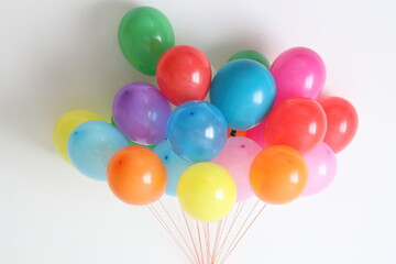 Fototapeta na wymiar Multicolored balloons. Many colorful festive, joyful balloons. 
