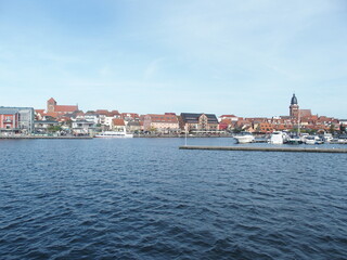 View over the Mueritz harbor to the old town of Waren, Mecklenburg-Western Pomerania, Germany, on the left the St. Georgen Church, on the right the St. Mary's Church