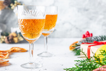 glass of champagne sparkling wine holiday christmas cocktail party mulled wine, grog wine spices new year drink sweet dessert copy space food background rustic. top view