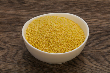 Raw cous cous heap in the bowl
