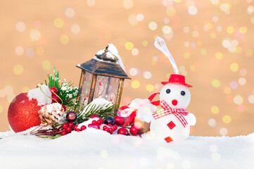 new Year's Christmas decoration postcard, snowman, spruce branch, red ball and New Year's lantern
