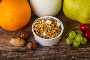 Breakfast with granola and milk