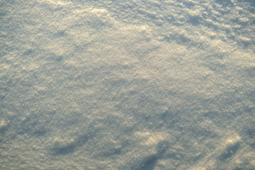 Uneven texture of snow in the sunset light