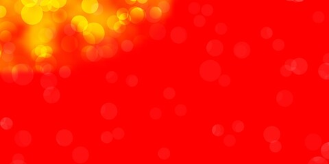 Light Red, Yellow vector background with bubbles.