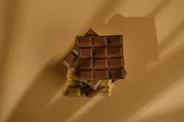 chocolate bar on brown background