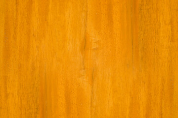 Minimalist orange color wooden board close up view for texture background