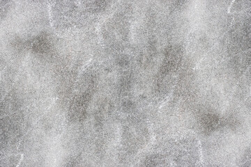 Sandy grunge texture on gray concrete wall for background