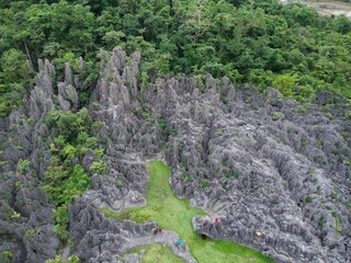 Fototapeta na wymiar Balocci Stone Park is located in Balleanging, South Sulawesi, Indonesia. This area is an exokarst hilly area with a steep topography. Including the Tonasa formation which was 50-15 million years ago.