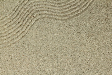 Fototapeta na wymiar natural brown sea sand wave texture background