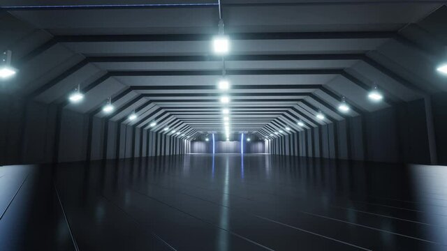 A large empty warehouse with reflective lights and floor