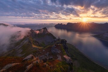 Stunning views from Hasfjulit to the Norwegian Sea and mountains at sunrise. Norway. Senja Island