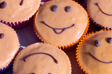Smiley . Smiley cakes on table.