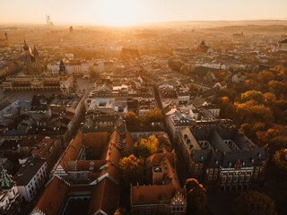 Sunrise view on Cracow main square and streets. Cracow, Lesser Poland province. St. Mary's Basilica, Rynek Glowny, Wawel castle - obrazy, fototapety, plakaty