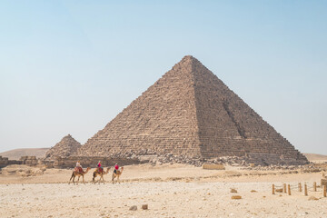 landscape of giza plateau with pyramids at background